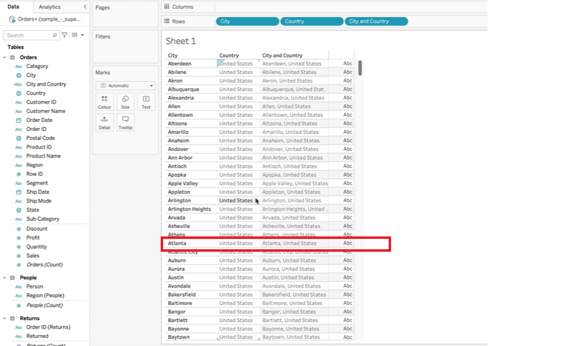 Completing the calculated field creation for city and country concatenation.