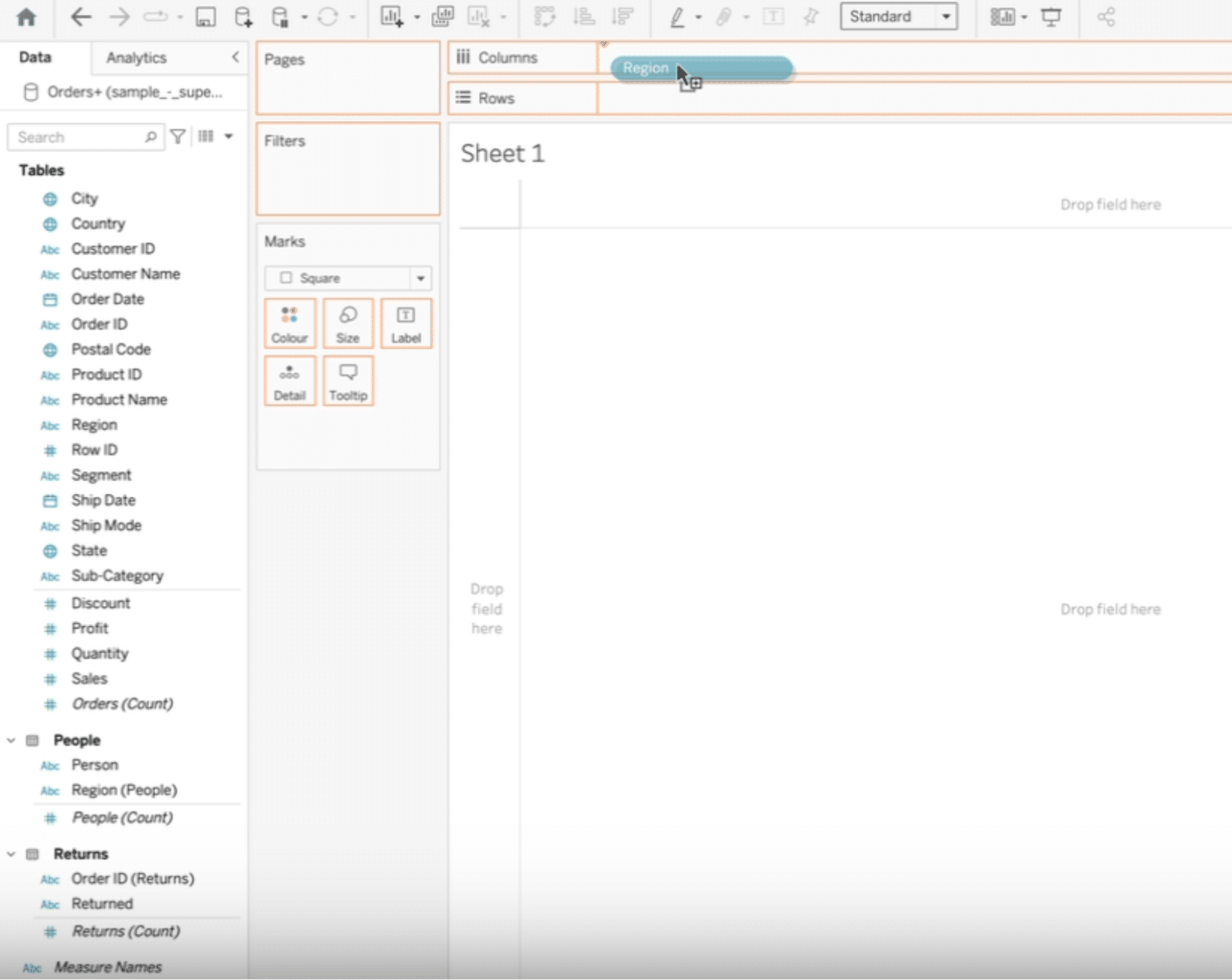 Screenshot of Tableau interface with 'Region' table being selected and dragged into the column section for heat map setup.